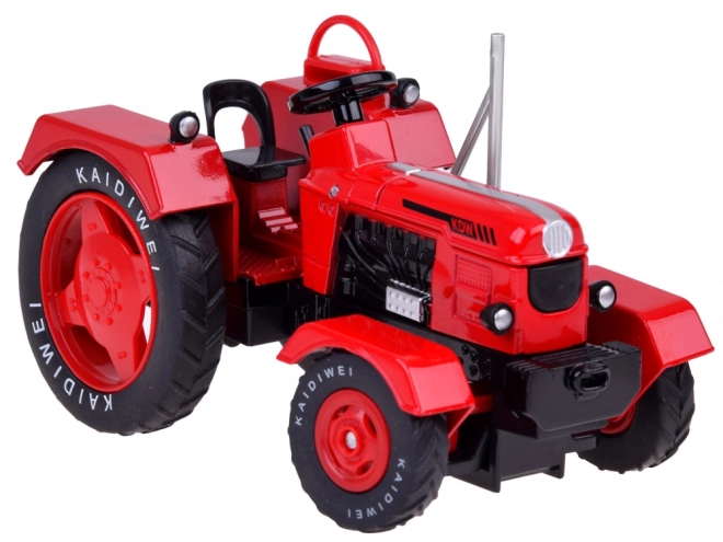 Rød metaltraktor med gummihjul 1:18