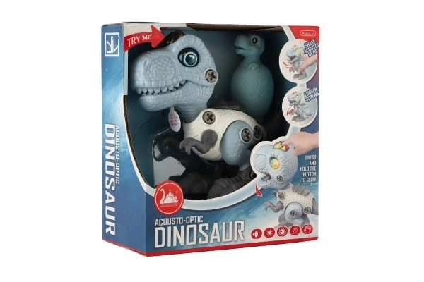 Dinosaurus skruelig plast 12cm med skruetrækker til batterier med lys og lyd i æske 15x16x7cm