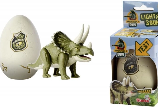 Lysende dinosaurfigur i æg