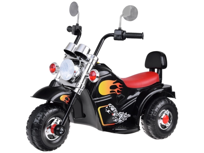 Børnemotorcykel på batteri med effekter