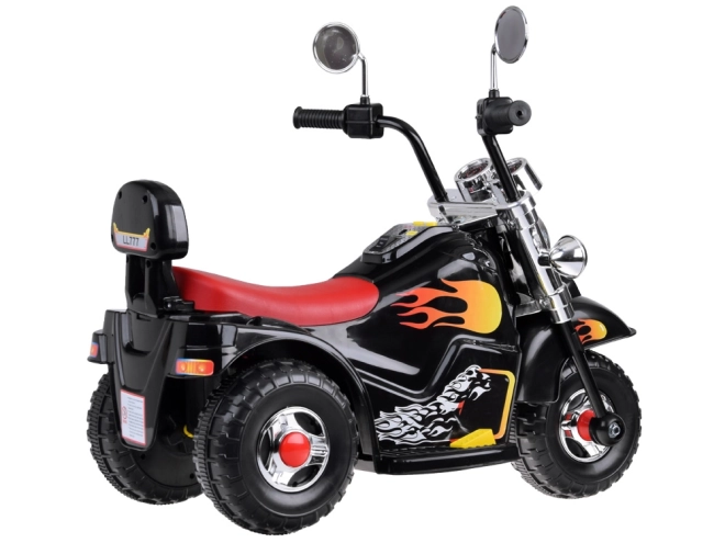 Børnemotorcykel på batteri med effekter