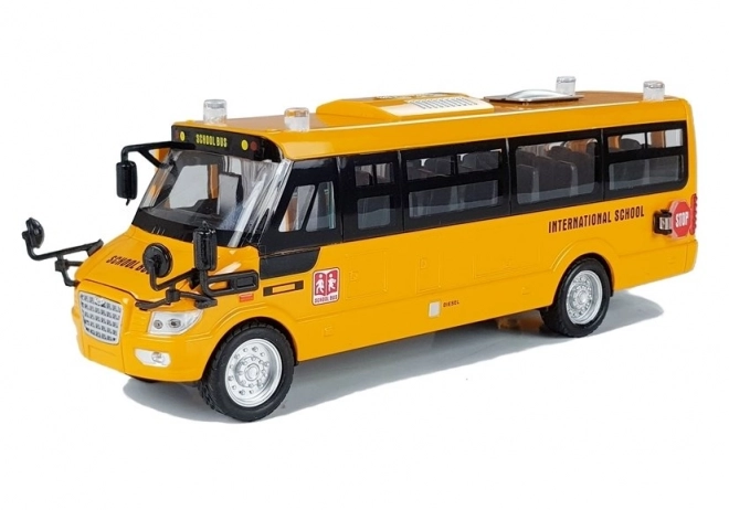 Metal skolebus med træk op motor