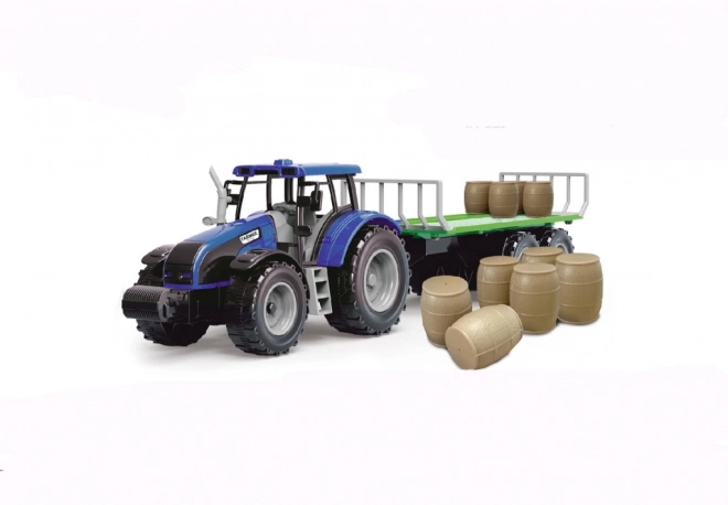 Traktor med svinghjul og trailer fyldt med hø