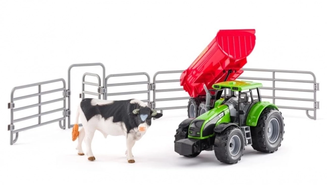 Traktor med anhænger og tyr med have