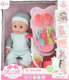 Babydukke der tisser med lyde 28 cm med tilbehør