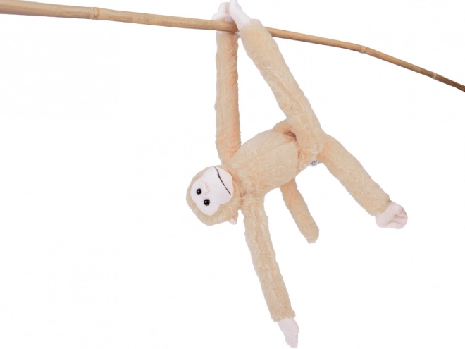 Hængende abe maskot i beige farve