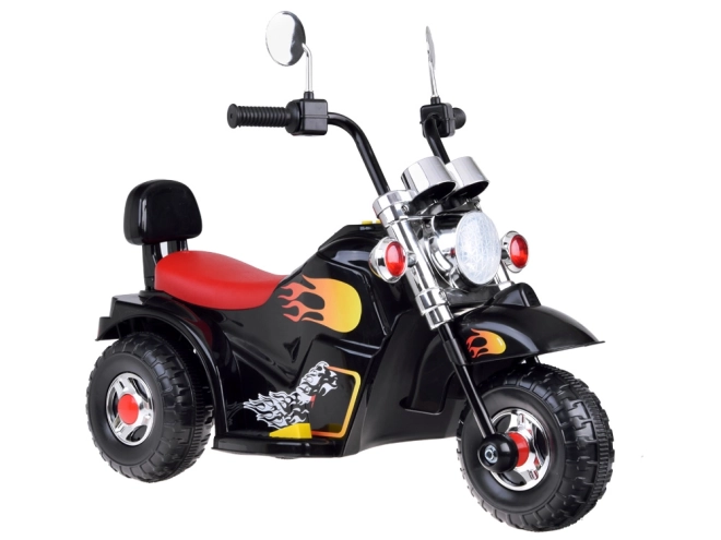 Børnemotorcykel på batteri med effekter