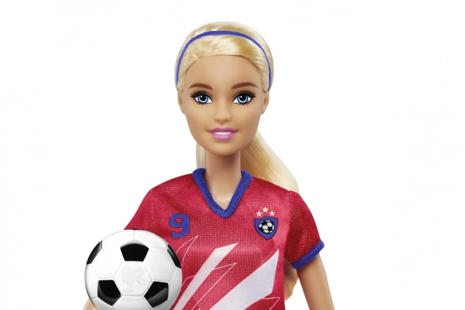 Barbie fodbolddukke i rød uniform