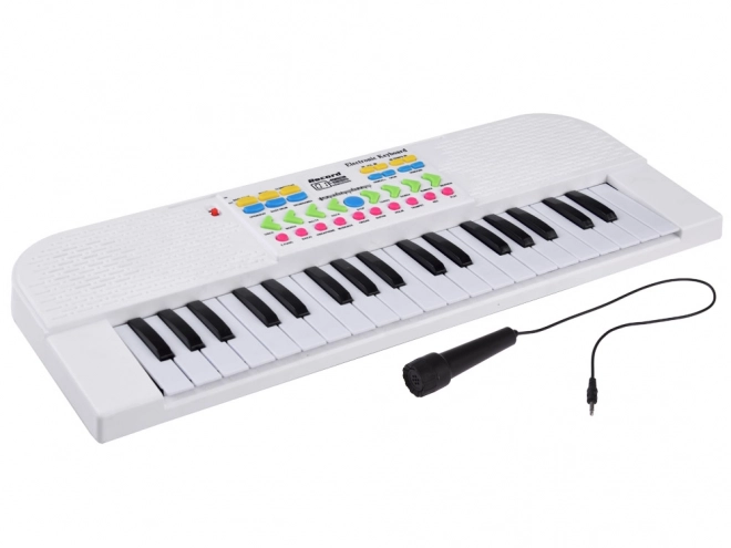 Elektronisk børnekeyboard med mikrofon