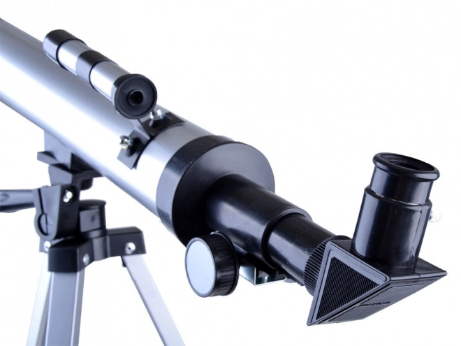Børneuddannelsesteleskop på stativ med zoomoptik
