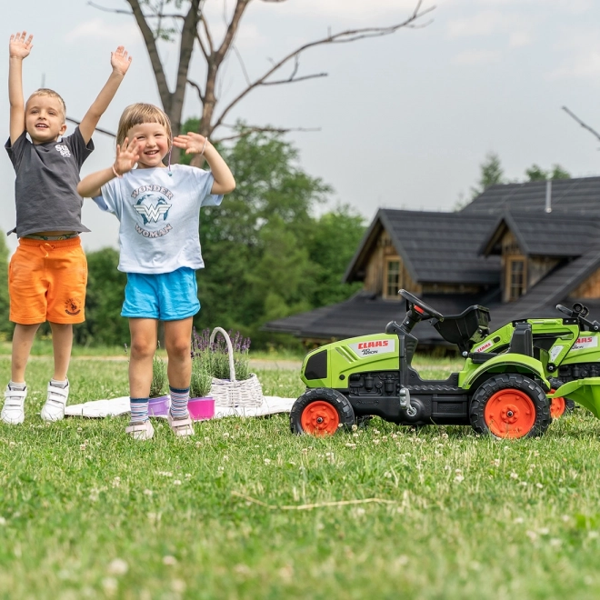 Træde-traktor Claas Arion 410 med trailer grøn