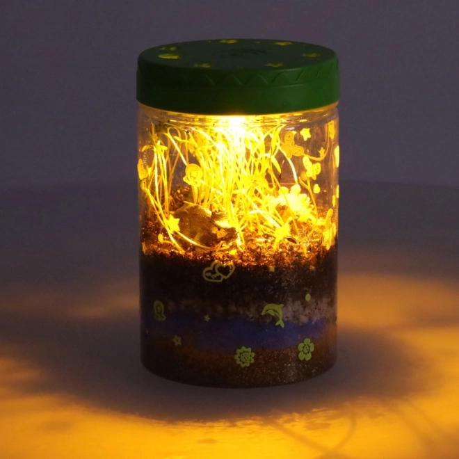 Terrarium til plantning med LED-lampe og dinosaurer