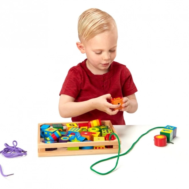 Store perler til børn at snøre