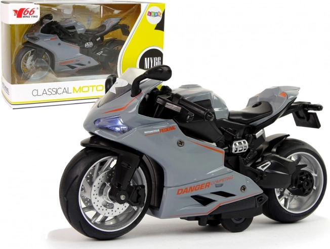 Sportsmotorcykel Model 1:12 med pull-back-drev, lyd og lys