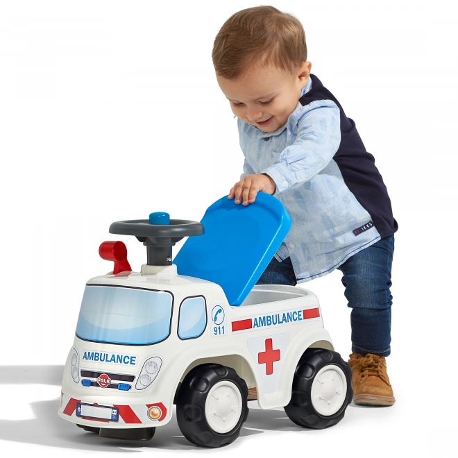 FALK Løbecykel Ambulance med åbent sæde og horn på rattet