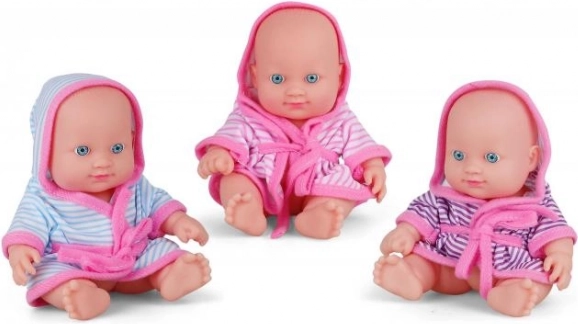Sødt babydukke i farverig badekåbe