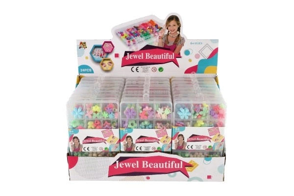 Plastperler farverige med snor i plastboks 10x17x2cm