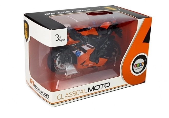 Orange legetøjsmotorcykel med fremdrift