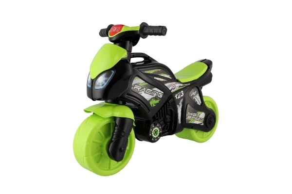 Løbecykel motorcykel grøn-sort plast på batterier med lys og lyd i pose 36x53x74cm