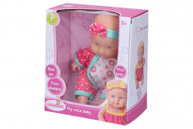 Baby med sløjfe