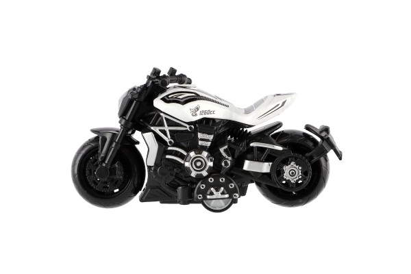 Motorcykel metal/plast 10 cm til tilbagespænding mix farver