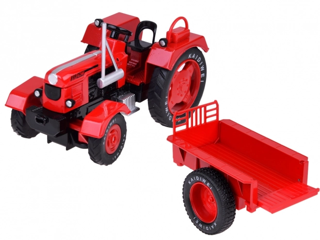 Rød metaltraktor med gummihjul 1:18