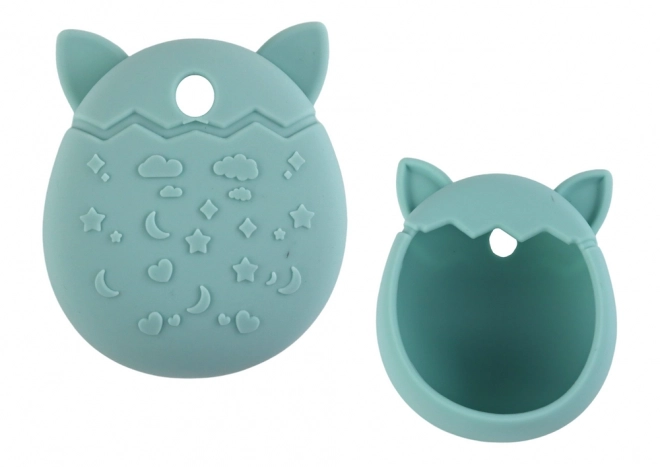 Silikoneetui til Tamagotchi med kattedesign og turkis nuance