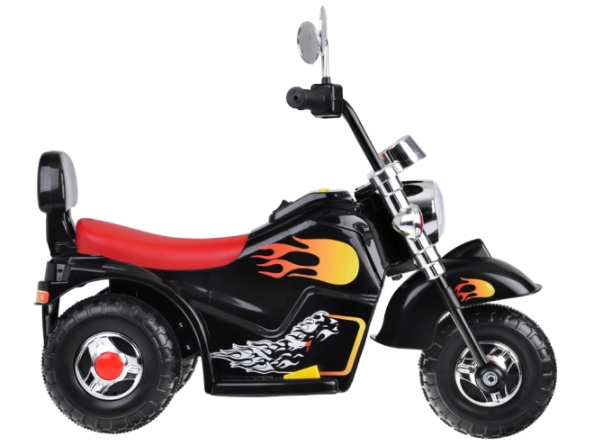 Børnemotorcykel på batteri med effekter