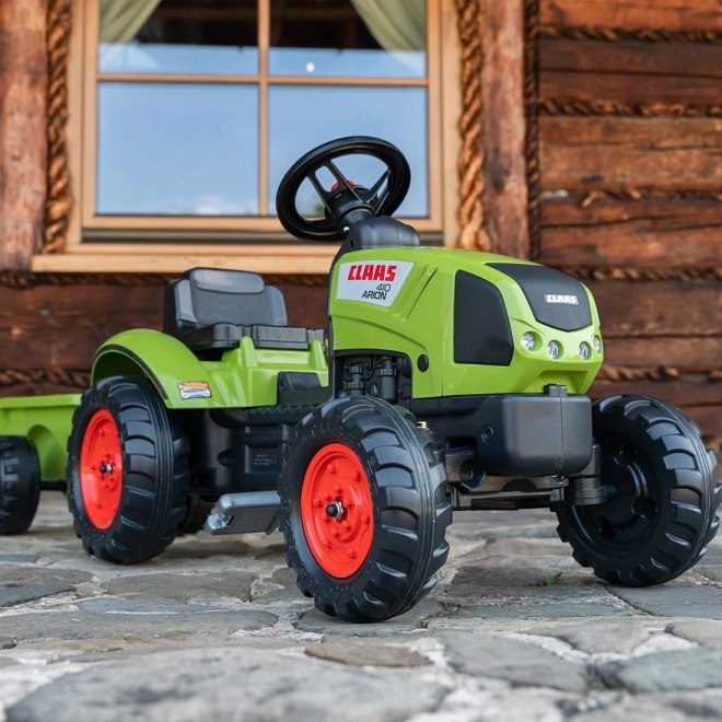 Træde-traktor Claas Arion 410 med trailer grøn