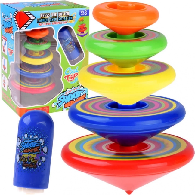 Farverig snurretop-pyramide med affyrings-launcher til børn