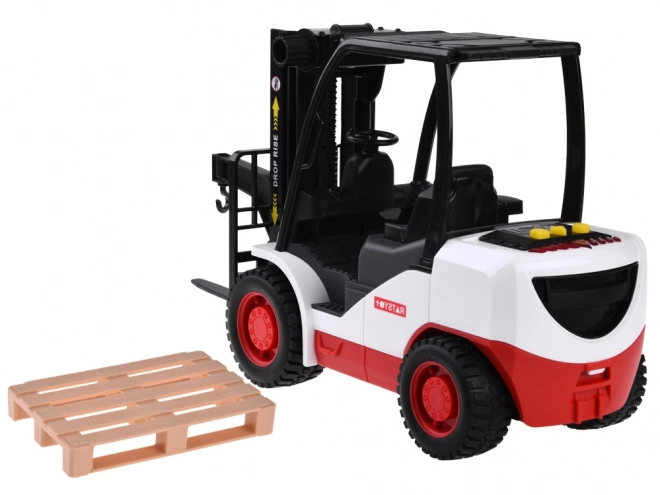 Stor gaffeltruck med palle