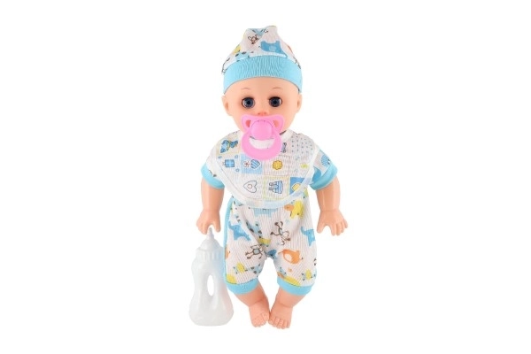 Panenka babydukke plast 32 cm fast krop drikker, tisser på batterier med lyd og tilbehør i pose