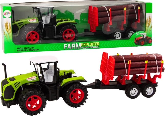 Grøn gårdtraktor med træstamme-trailer