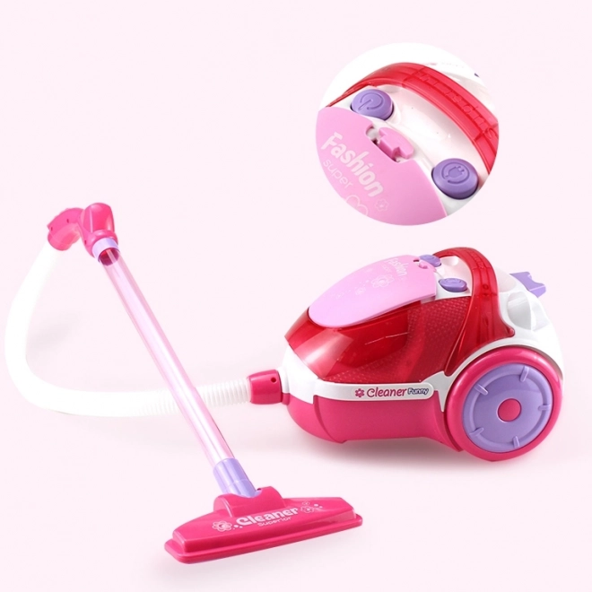 Børnestøvsuger i pink med sugefunktion