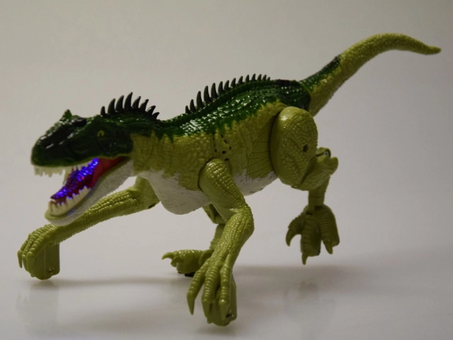 Grøn dinosaur med fjernbetjening