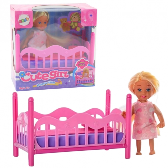 Sæt med mini dukke i pyjamas pink seng