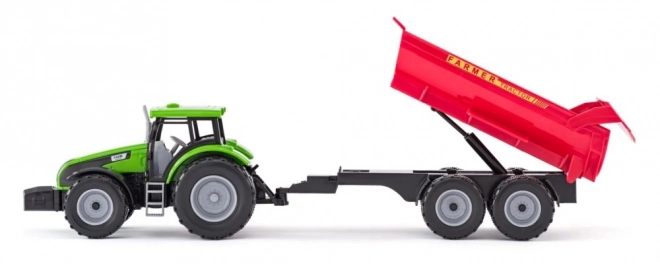 Traktor med anhænger og tyr med have