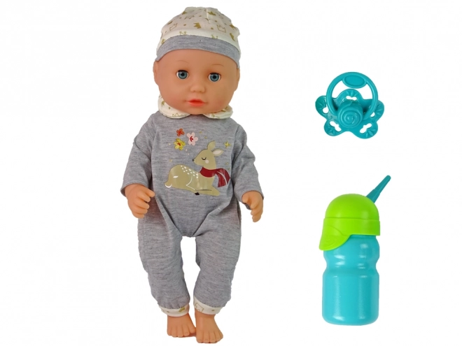 Babydukke i gråt pytjamas med lyde og tilbehør