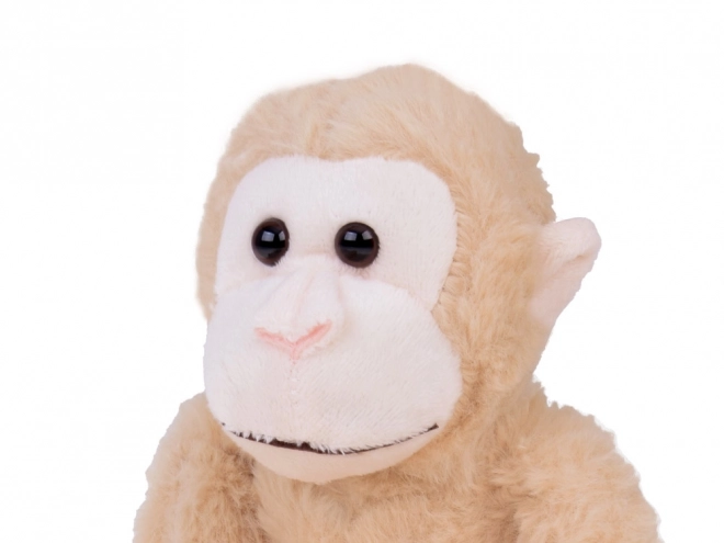 Hængende abe maskot i beige farve