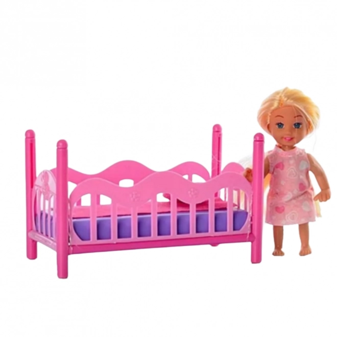 Sæt med mini dukke i pyjamas pink seng
