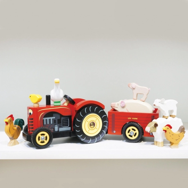 Le Toy Van rød traktor og trailer