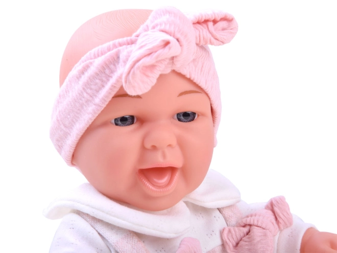 Realistisk baby med smil