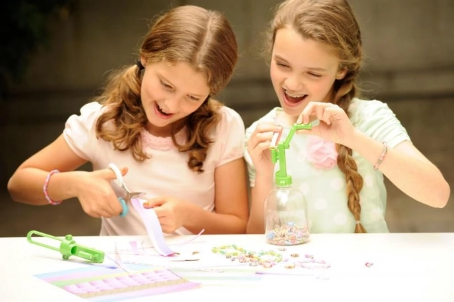 Genbrugsanordning til fremstilling af papirperler