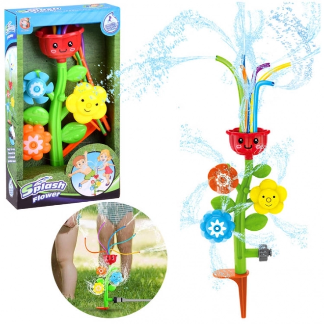 Glad blomsterbørns vandspreder