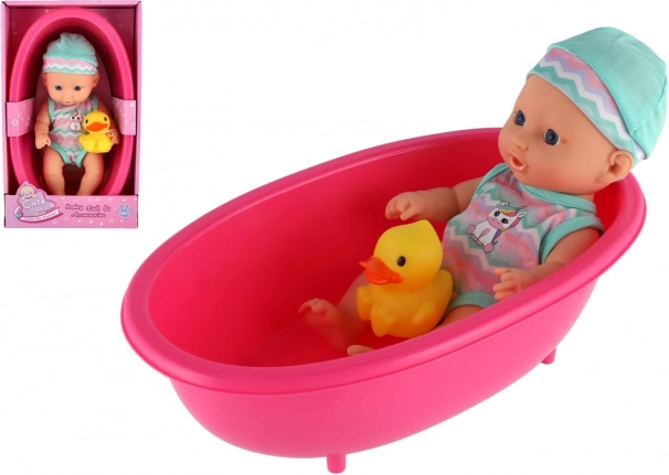 Babydukke i badekar med lille and 22 cm