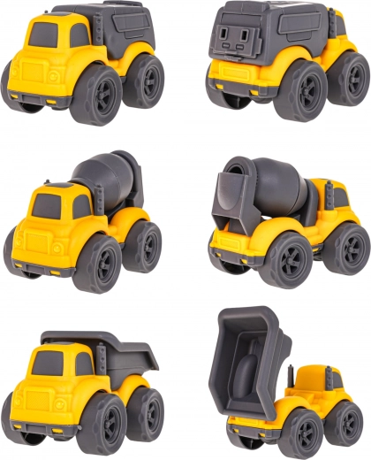 Tre bygge­køretøjer med bevægelige dele