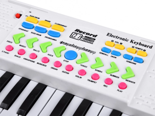 Elektronisk børnekeyboard med mikrofon