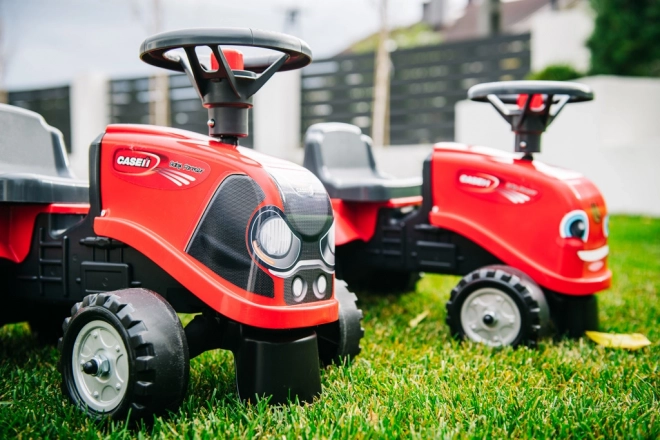 Kørende traktor Baby Case IH rød med trailer