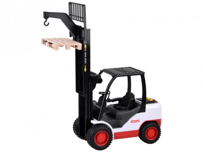 Stor gaffeltruck med palle