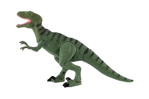 Dinosaurus gående IC velociraptor plast 50cm på batteri med lyd og lys i kasse 53x32,5x12cm